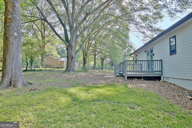 view of yard featuring a deck