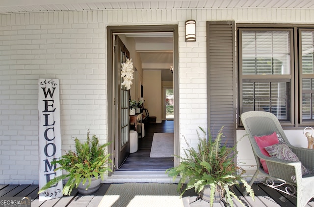 doorway to property with a porch