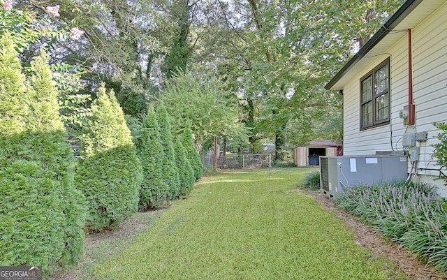 view of yard featuring central AC unit