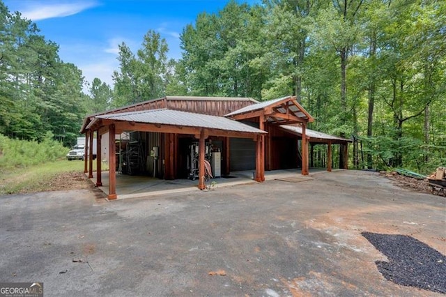 exterior space featuring a carport