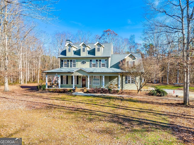 view of front of property with a front lawn and a porch