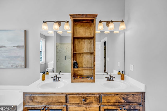 bathroom with vanity and a shower with shower door