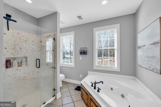 bathroom with toilet, a wealth of natural light, plus walk in shower, and tile patterned flooring