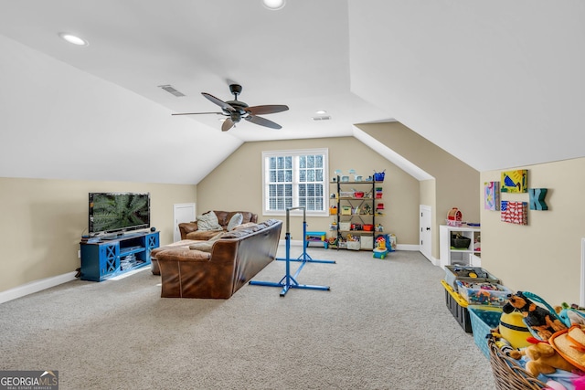 playroom featuring vaulted ceiling, ceiling fan, and carpet