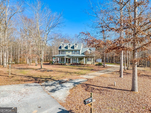 view of front of home featuring covered porch