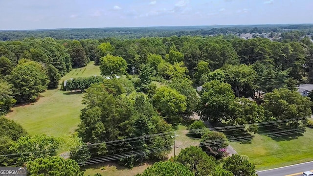 birds eye view of property featuring a rural view