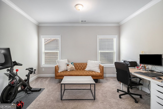 home office with visible vents, crown molding, light carpet, and baseboards