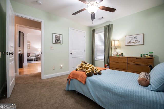 bedroom featuring carpet and ceiling fan