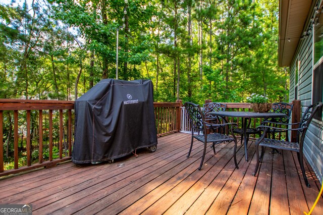 deck featuring a grill