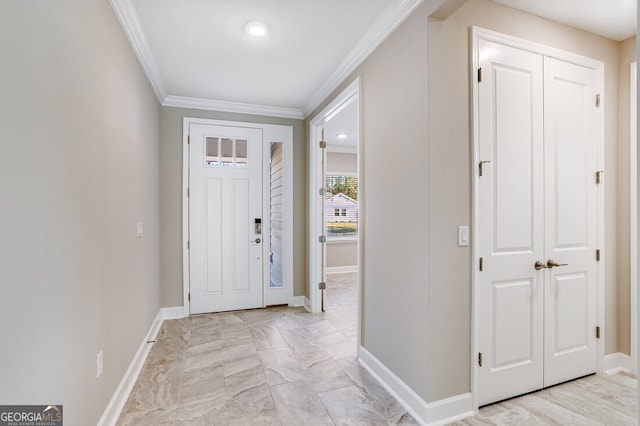 entrance foyer featuring ornamental molding