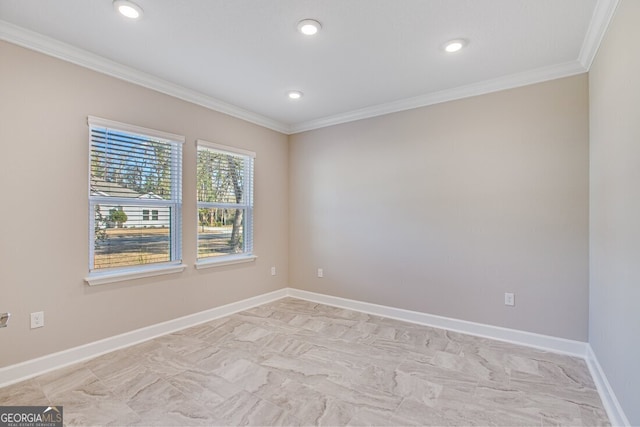 empty room featuring ornamental molding