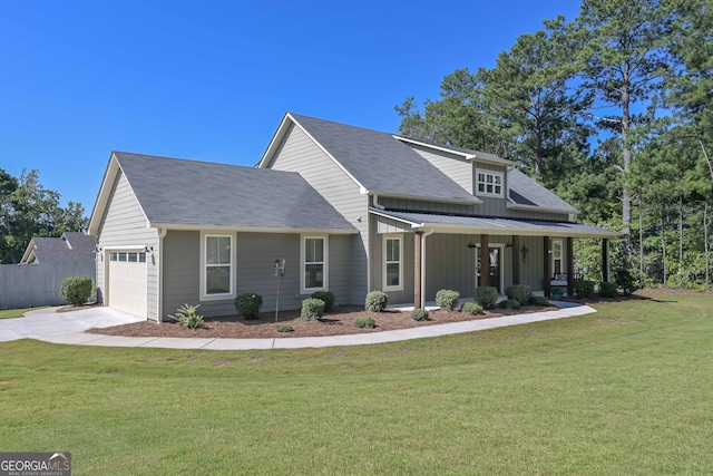 view of front facade with a garage and a front yard