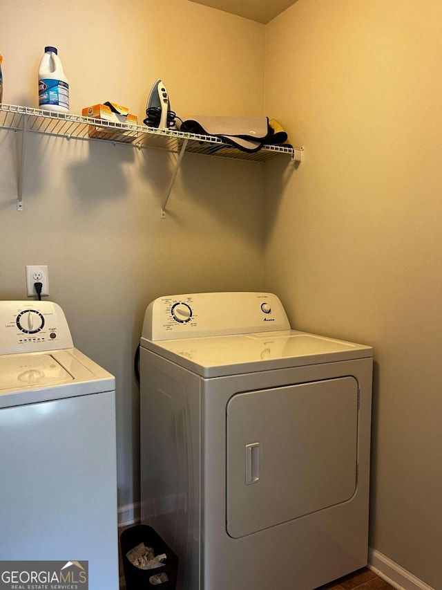 washroom featuring separate washer and dryer