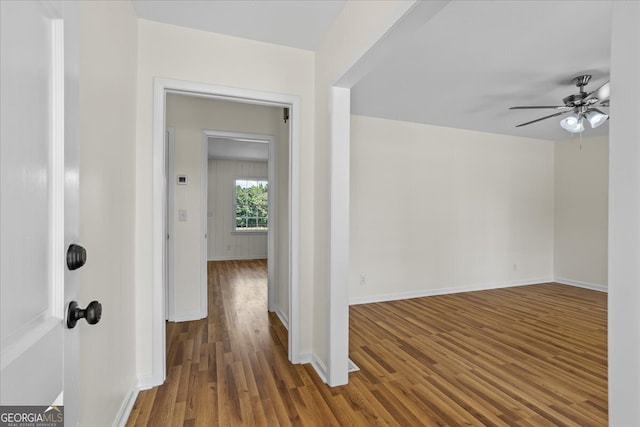 hallway featuring dark hardwood / wood-style floors