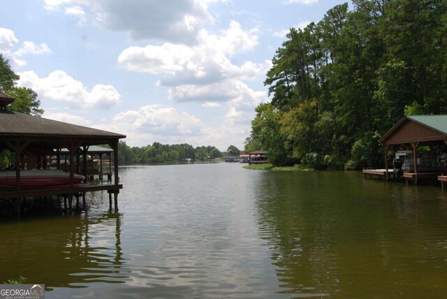 view of dock with a water view