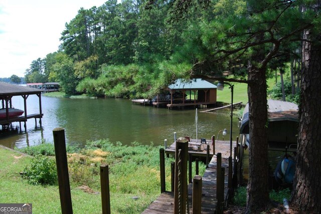 view of dock with a water view