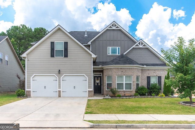 craftsman inspired home with a front yard and a garage