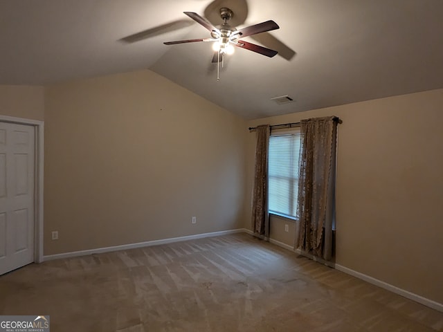 bonus room featuring lofted ceiling, ceiling fan, and light colored carpet