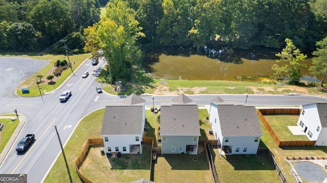 drone / aerial view with a water view