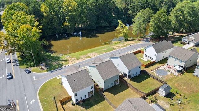 bird's eye view with a water view