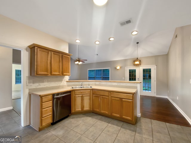 kitchen with dishwasher, kitchen peninsula, sink, ceiling fan, and light tile patterned flooring