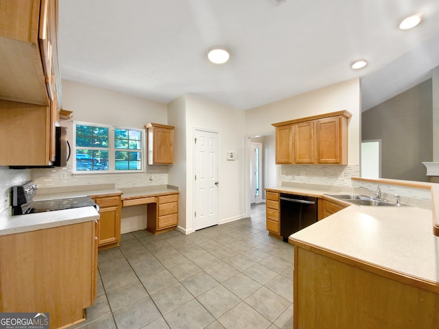 kitchen featuring appliances with stainless steel finishes, light tile patterned floors, decorative backsplash, and sink