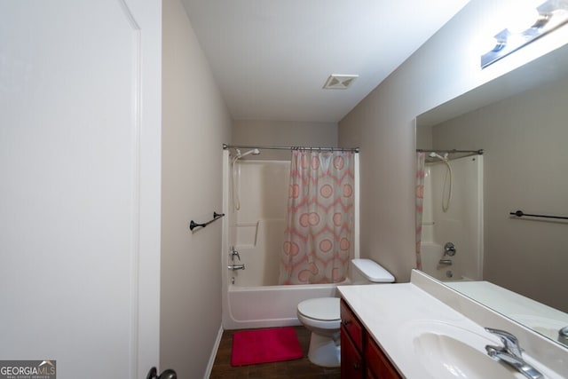 full bathroom with vanity, toilet, shower / tub combo, and wood-type flooring