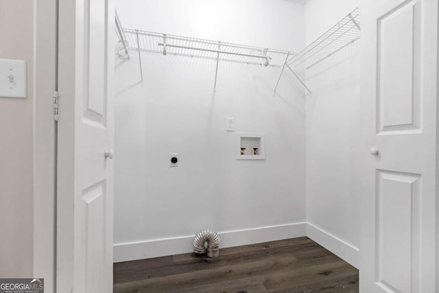 clothes washing area with washer hookup, hardwood / wood-style floors, and hookup for an electric dryer