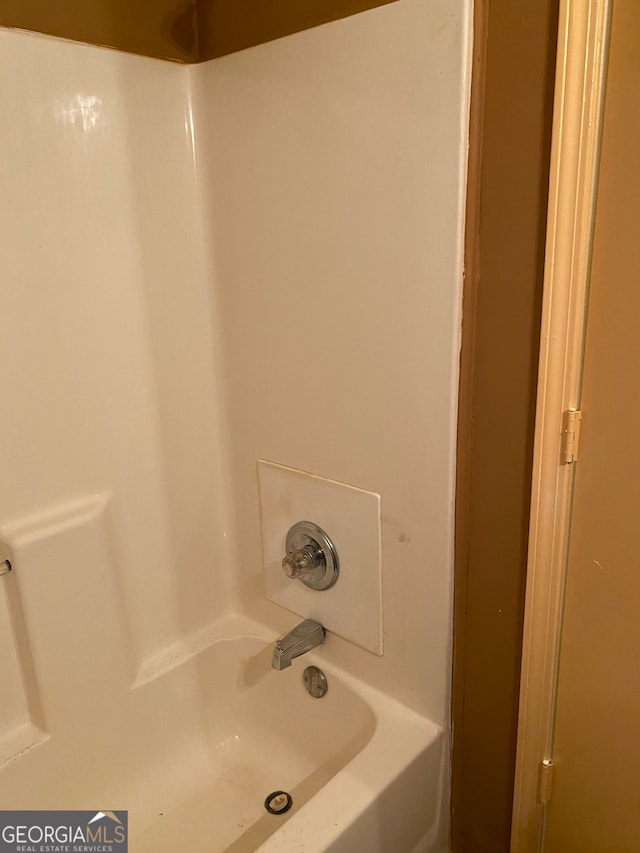 bathroom featuring shower / tub combination