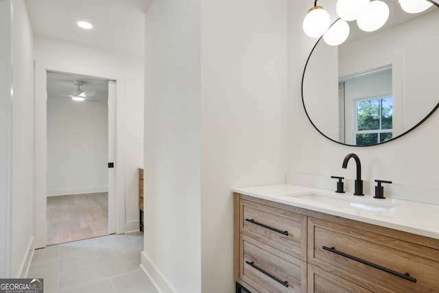 bathroom with tile patterned floors and vanity