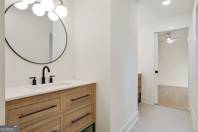 bathroom featuring tile patterned flooring and vanity