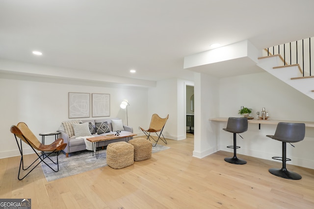 living room with light hardwood / wood-style floors