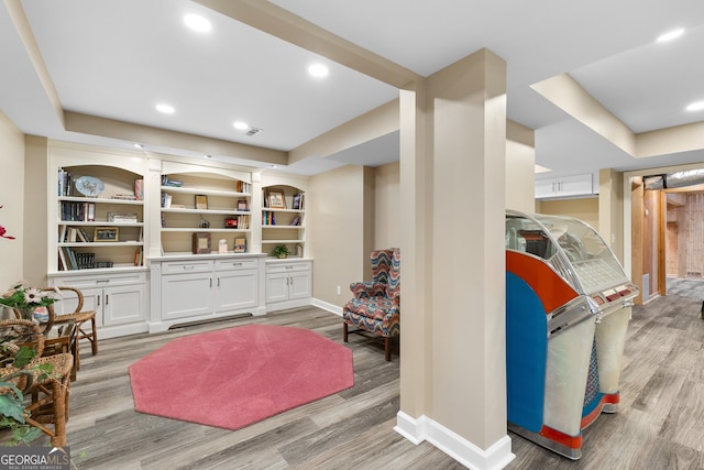 sitting room with light hardwood / wood-style floors