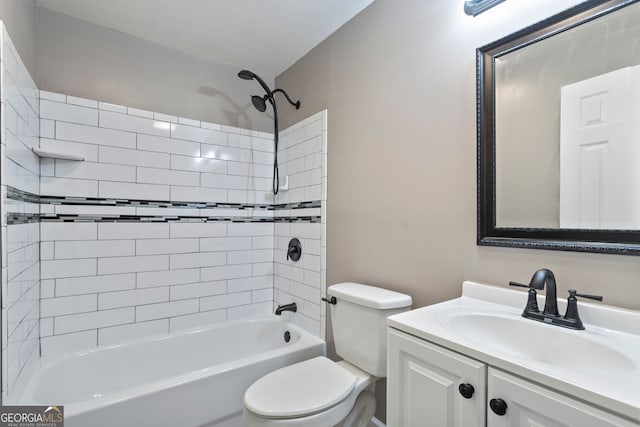 full bathroom featuring vanity, toilet, and tiled shower / bath combo