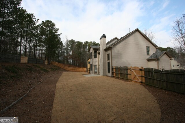 view of front of house with a garage and a front yard