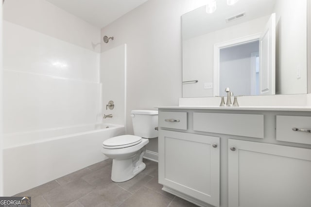 full bathroom featuring toilet, washtub / shower combination, visible vents, and vanity