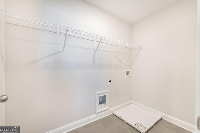 laundry room with hookup for a washing machine, laundry area, electric dryer hookup, and baseboards