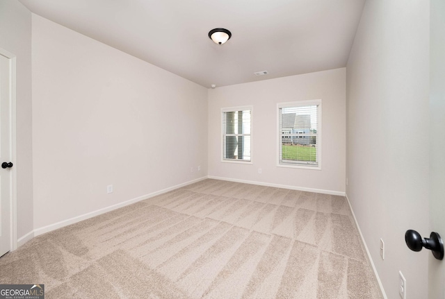 view of carpeted spare room