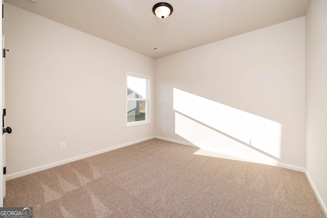 view of carpeted spare room