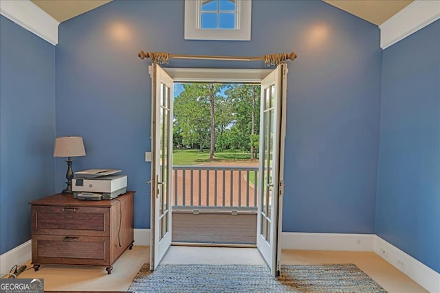 doorway with light carpet