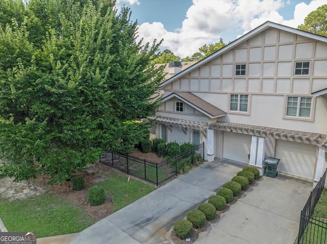 view of front of property featuring a garage