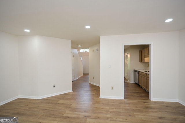 spare room with light hardwood / wood-style floors