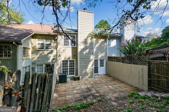 back of property with central air condition unit