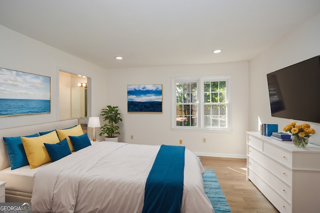 bedroom featuring light hardwood / wood-style flooring