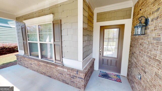 entrance to property with covered porch