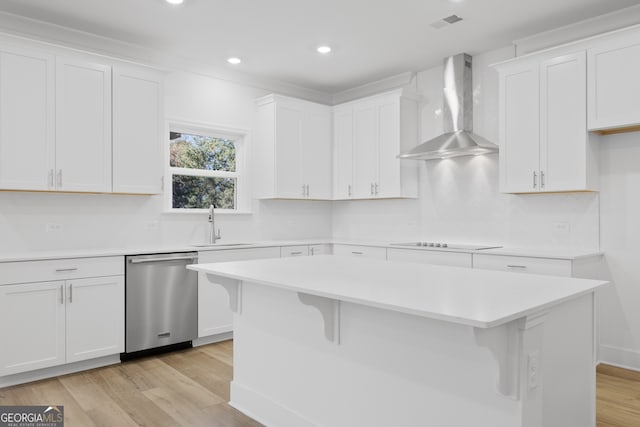 kitchen featuring a kitchen island, white cabinetry, dishwasher, black electric cooktop, and wall chimney exhaust hood