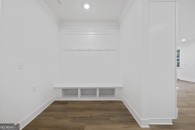 mudroom with crown molding and dark hardwood / wood-style floors