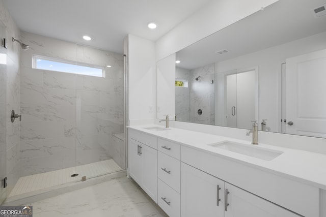 bathroom featuring vanity and walk in shower