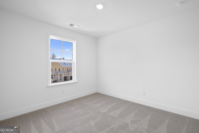 view of carpeted spare room