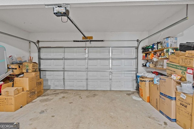 garage featuring a garage door opener